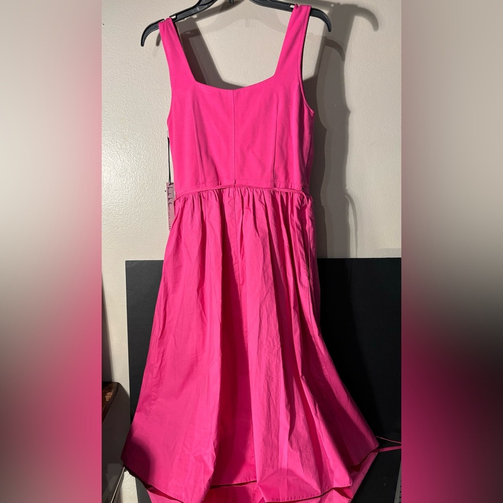 Nicole Miller, New York size medium. NWT. Hot pink dress. Side pockets and belt